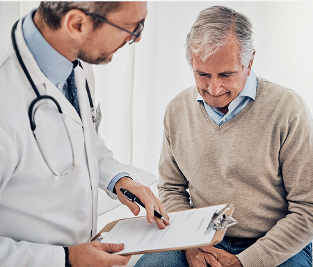 doctor discussing with orange tshirt women